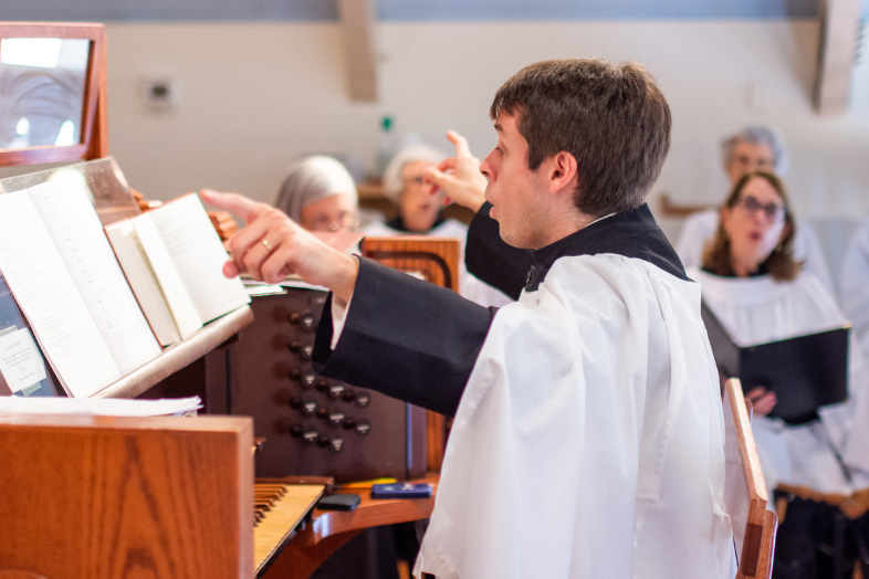 Choir Director leading the choir
